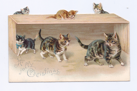 A Victorian Christmas card of kittens playing in a wooden box, c.1880 (colour litho)