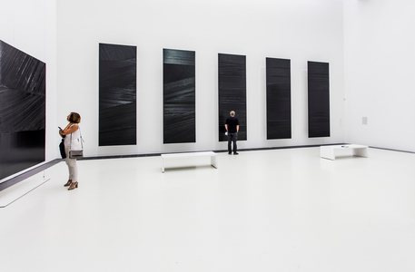 Visitors looking at a Painting, during the exhibition Les derniers Soulages: 2010-2022, Musée Soulages, Rodez (photo)