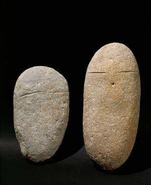 Anthropomorphic figurines with eyes and mouth indicated (clay)