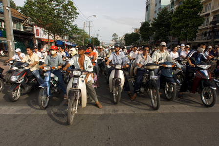 Hundreds of motorists waiting for a traffic light to turn green on a street in Ho Chi Minh City, Saigon, Vietnam (photo)