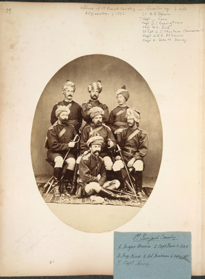Officers of 1st Punjab Cavalry, Afghanistan. Full-length studio portrait of seven cavalry officers, identified on accompanying slip as follows: Major [G.B.] Unwin; Capt Fane; D.S.C. [Capt D.S. Cuninghame]; Maj [G.C.] Bird; Col [Charles Smith] Maclean [Commander]; Capt [J.R.B.] Atkinson; Capt [H. de la M.] Hervey