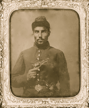 Seated black soldier with pistol and jacket 1865 (photo)