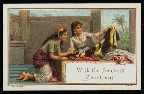 Two Indian women sorting through fabrics, Christmas greetings card. (chromolitho)