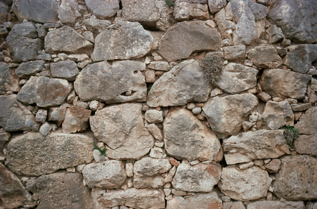 Citadel of Mycenae, wall near the postern gate built of irregular limestone blocks (limestone)