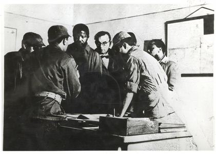 Nelson Mandela (centre) and Robert Resha (right) meeting with officers in the Algerian army, 1962 (photo)