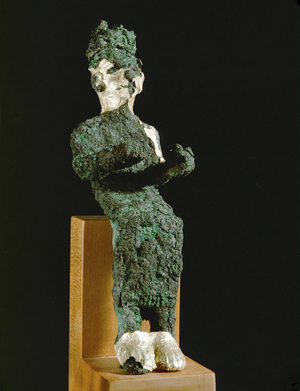 Seated god from Tell Abu Hawam Gilded bronze figurine Canaanite (bronze)
