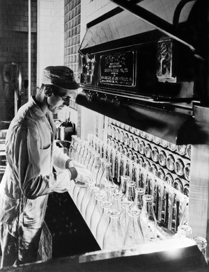 Inspecting Milk Bottles (b/w photo)