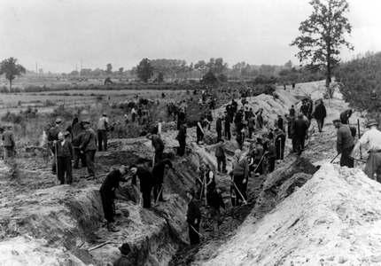 German civilians construct border fortifications on the Dutch border, 1944 (b/w photo)