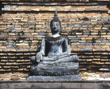 Thailand. Stone Buddha. Main stupa, Wat Mahathat. 13th century. Sukhothai.