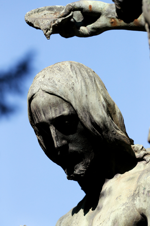 Monumental Cemetery. Baptism of Christ with John the Baptist. Bronze statue. Milan. Italy.