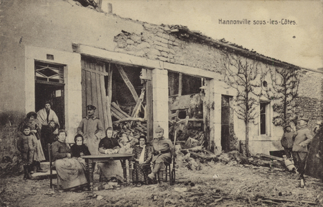German soldiers with French civilians, Hannonville sous-les-Cotes, Meuse, France, World War I (b/w photo)