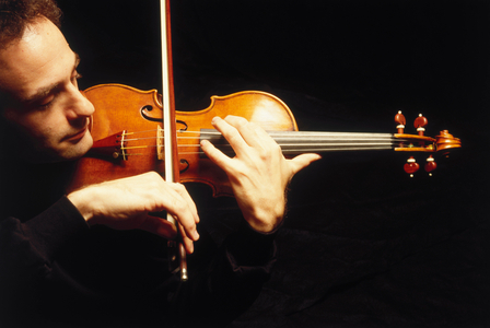 Violin being played by