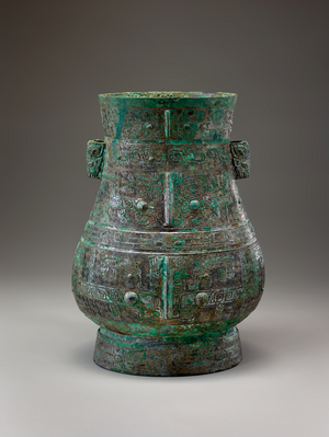 Ritual wine container (hu) with masks (taotie) and dragons, c.1200 BCE (bronze)