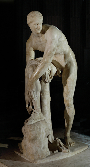 Hermes tying his sandal …