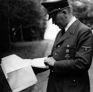 Adolf Hitler studying files, 1940 (b/w photo)
