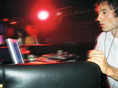 The Micronauts (Christophe Monier) performing live in club, Paris, France, 2005 (photo)