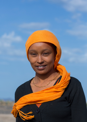 Kenya, African woman with an orange scarf, Turkana lake, Loiyangalani, Kenya, Africa (photo)