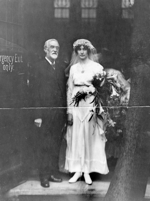 Official photograph taken on the British Western Front showing bride and father of the bride on her wedding day, 1917-1918 (photograph)