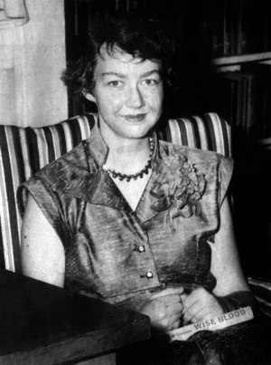 Flannery O'Connor with her book "Wise Blood", 1952 (b/w photo)