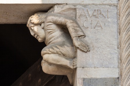 Epistyle corbel with allegory of avarice, main portal, Cathedral of Piacenza, Piacenza, Emilia-Romagna, Italy (photo)
