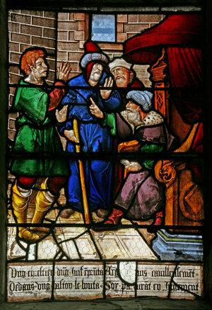 Window w3 depicting a deal concerning a money loan is arranged: A man borrows money from a Jew (stained glass)