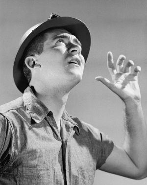 Close-up of a construction worker calling