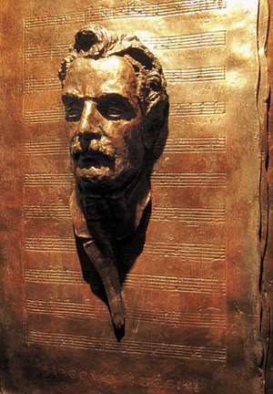 Puccini bronze mask