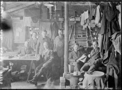 First World War internees inside an internment hut, Douglas or Knockaloe Camp, Isle of Man, 1917 (b/w photo)