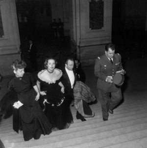 L-R: Mrs Grossin, Mrs De Bry and her Husband Michel De Bry and French General Paul Grossin at Paris Opera on May 16, 1947 (b/w photo)