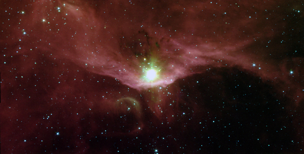 Sharpless 140 lies almost 3000 light-years from Earth in the constellation Cepheus. At its heart is a cluster of three deeply embedded young stars, which are each several thousand times brighter than the Sun. Spitzer Space Telescope.