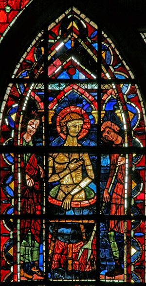 Window w202 depicting a scene from the legend of St John: the saint in a cauldron of boiling oil (stained glass)