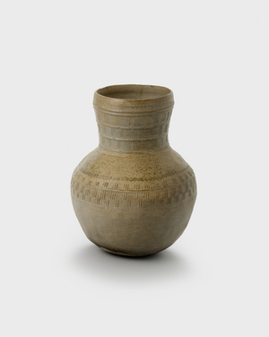 Jar, c.500 (Stoneware with accidental ash glaze and
incised decoration)