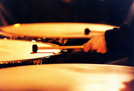 Timpani being played with