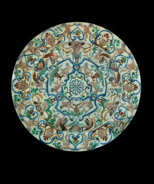 Faience plate, decorated with grotesque ornaments …