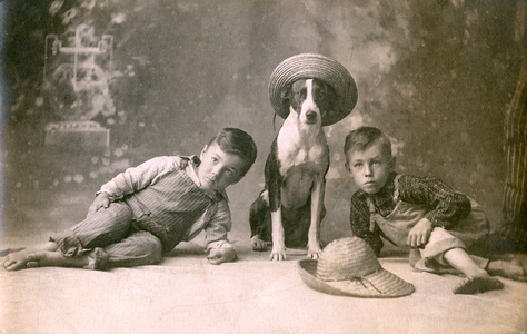 A Dog in a Straw Hat with Two Boys, 1907 (toned silver print)