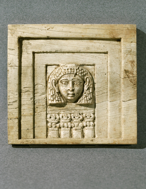 Goddess Astarte in a window. Woman in a window: ) Ivory relief …