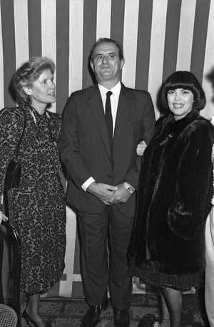 French cook Paul Bocuse with his wife and Mireille Matthieu for the 10th birthday of "Beauvilliers" restaurant, Montmartre, Paris, October 29, 1984 (b/w photo)