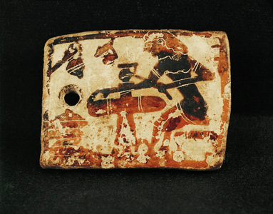 A potter sitting at his wheel …