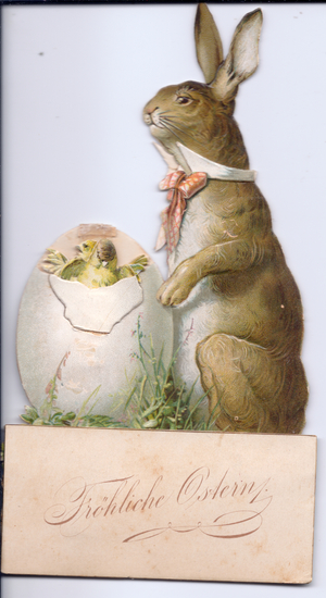 A Victorian animated Easter card of a rabbit wearing a stiff collar and tie with a newly hatched chick, c.1880 (colour litho)