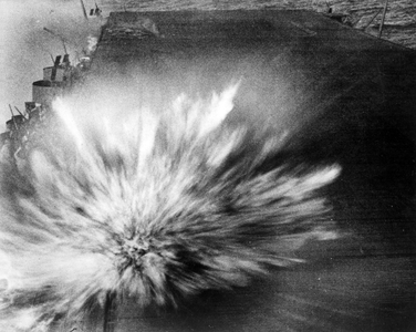 A Japanese bomb explodes on the flight deck of Enterprise