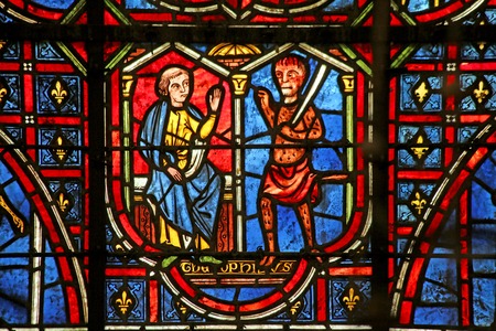 Theophilus is tempted by demons (stained glass)