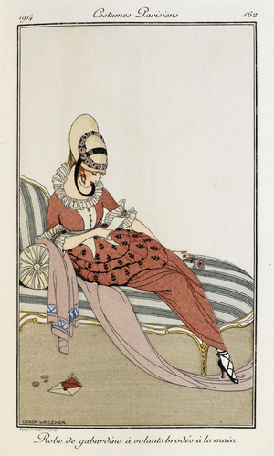 Robe de gabardine à volants brodés à la main. Woman sitting on a chaise longs wearing a gabardine dress in pink with hand embroidered ruffles. Also wearing a straw hat with pink rose border.
Costumes Parisiens.