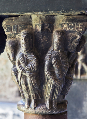 Historiated column in the Romanesque cloister, Collegiate church of Saint Orso, Aosta, Aosta Valley, Italy (photo)