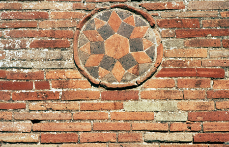 Roman wall construction: Opus latericium, made of coloured bricks, here in the formof a wheel or star