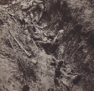 Bodies of dead German soldiers in a trench, World War I (b/w photo)