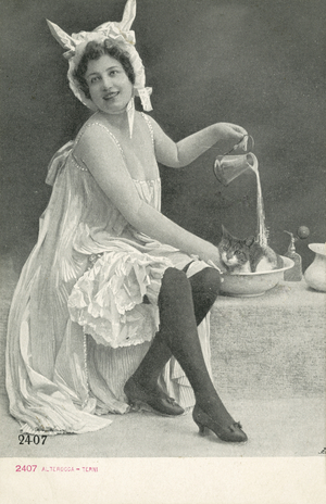 Woman in a bonnet with donkey's ears (b/w photo)