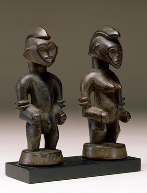 Male and female figures (wood) 
