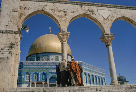 Jerusalem, Jordan, Men stand near an arched entranceto the Dome of the Rock, 1966 (photo)
