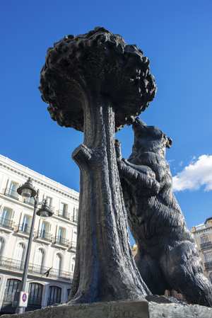 Statue of Bear and strawberry tree symbol of Madrid in Puerta del Sol square in the city centre, Madrid, Spain, 2019 (photo)