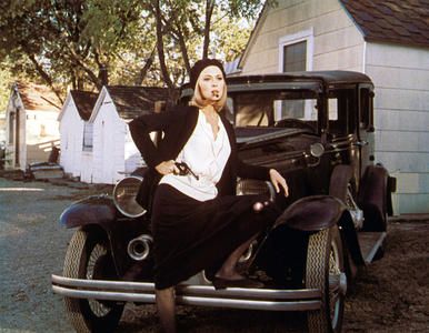 Full Shot Of Faye Dunaway As Bonnie Parker Leaning On Car While Holding A Gun/Pistol, Cigarette In Mouth., Bonnie And Clyde 1967 Directed By Arthur Penn